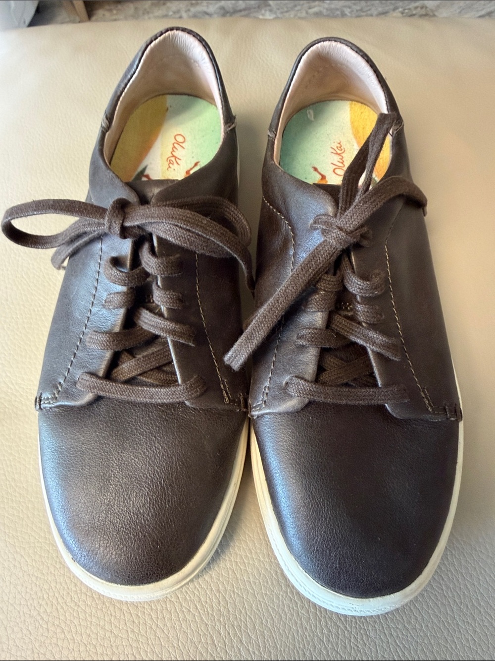 OluKai Shoes with Black Leather Label and Multicolor Insole Accent